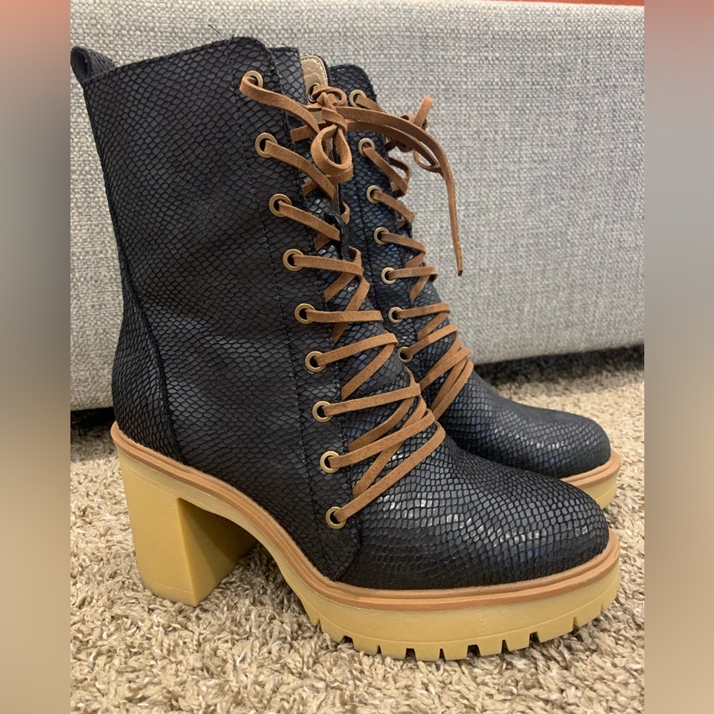 Oasis Society black lace up boot. Worn once. Size 9! Zip up on inside.